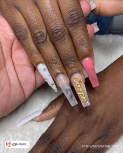 Coffin Shaped Birthday Nails With A Different Design On Each Finger
