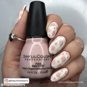 Cow Print Nails With Pink Spots On Almond Shape