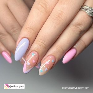 Cute Acrylic Almond Shape Nails With Hearts Over White Surface