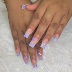 Cute Lilac French Acrylic Nail Designs With Flowers Over White Towel
