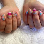 Cute Summer Almond Acrylic Nails With Rainbows And Stars Over White Fur