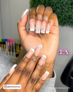 Cute White Birthday Nails With Nude Base And White Tips