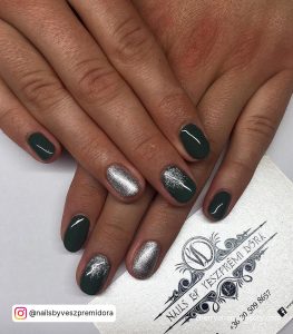 Dark Green Nails With Silver With Ombre Effect On One Finger