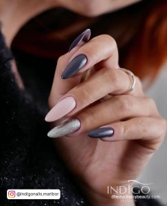 Dark Purple Nails With Silver Glitter In Stilleto Shape