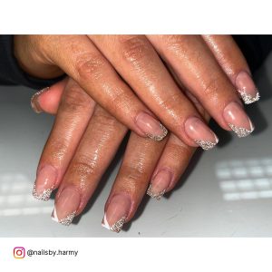 Double Square French Acrylic Nails Over White Surface