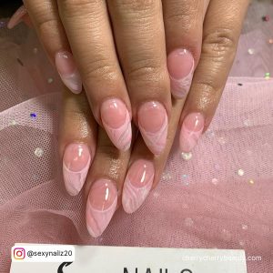 French Almond Acrylic Summer Nails Over Pink Surface