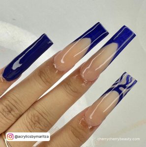 Glossy Blue French Tip Acrylic Nails Over White Background