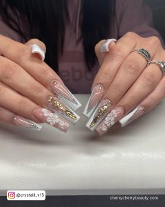 Gold Acrylic Nails Ideas With White Tips And Flowers