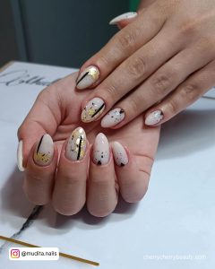 Gold Black And White Line Nail Design