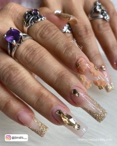 Gold Glitter Acrylic Nails With Rhinestones