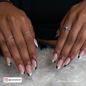Half French Tip Almond Acrylic Nails Over White Fur