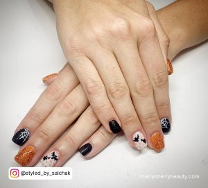 Halloween Short Acrylic Nails In Black And Orange
