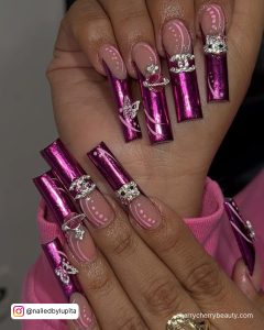 Hot Pink Chrome Nails With Embellishments