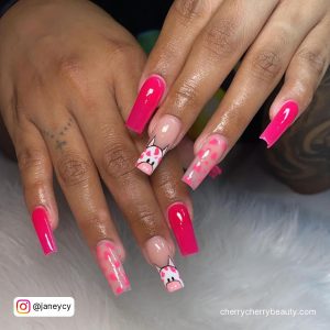 Hot Pink Nails With Cow Print On Two Fingers
