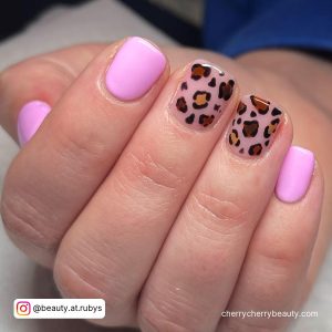 Light Pastel Pink Nails With Dotted Pattern On Two Nails