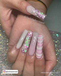 Light Pink Christmas Nails With Glitter