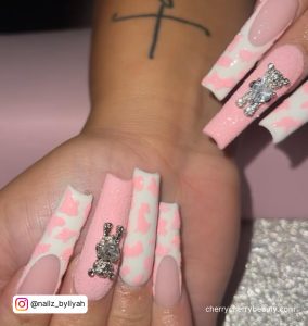 Light Pink Cow Print Nails In Coffin Shape With Teddy Bear