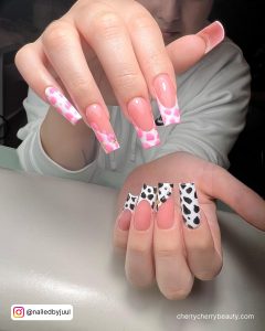 Light Pink Cow Print Nails With Black And White Combination