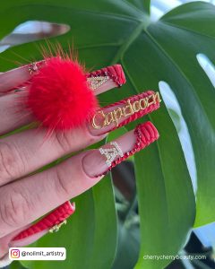 Long Acrylic Birthday Nails With Red Tips For Capricorn