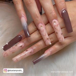 Long Baddie Acrylic Coffin Fall Nail Designs With Stones And Heart Design Over White Fur
