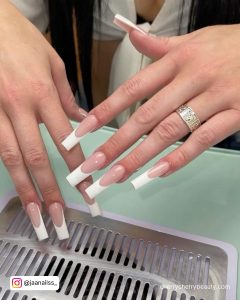 Long Coffin French Tip Acrylic Nails Over Perforated Metal