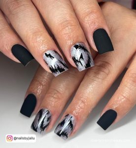 Matte Black And Silver Nails