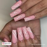 Matte Pink Square Acrylic Nails With Snowflakes