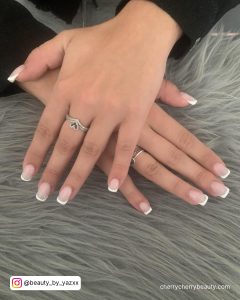 Natural Acrylic French Top Nails Over Grey Fur