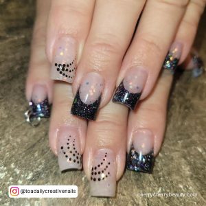 Natural Acrylic Nails With Glitter Tips And Sparkles On Shimmery Surface