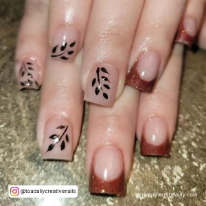 Natural Clear Acrylic Nails With Glitter Tips Over Marble Surface