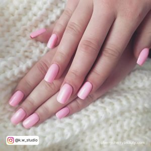 Natural Pink Square Nails On A White Surface