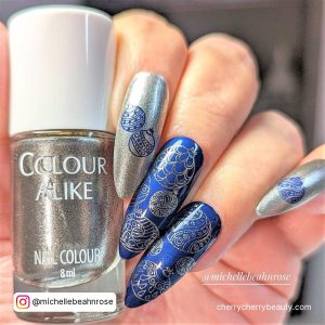 Navy And Silver Nail Designs Made With Stencils