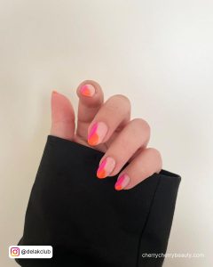 Neon Orange And Pink Nails With French Tip Design