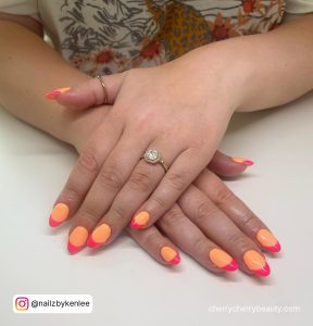 Neon Pink And Neon Orange Nails In French Tip Design