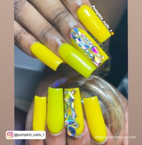 Neon Yellow Acrylic Nails With Rhinestones