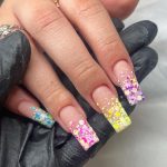 Ombre Acrylic Nails In Pink, Yellow, And Purple