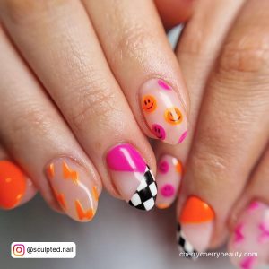 Orange And Hot Pink Nails With Smileys And Race Flag