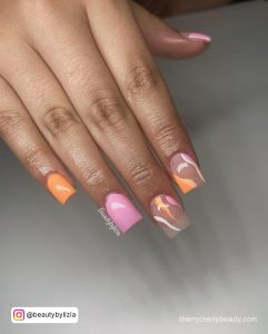 Orange And Pink Nail Designs With Swirls