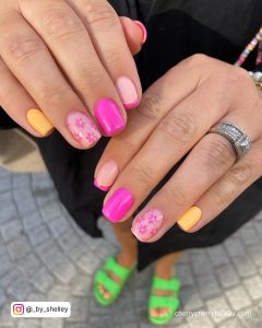 Orange And Pink Nails With Flowers
