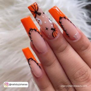 Orange Halloween Acrylic Nails With Black Stitches