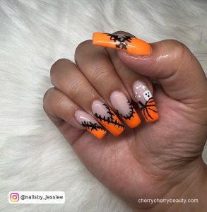 Orange Halloween Acrylic Nails With Stitches And Webs