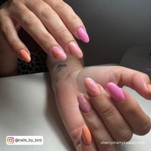 Pastel Orange And Pink Nails With Hearts