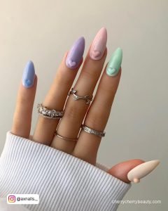 Pastel Pink And Purple Nails With Hearts