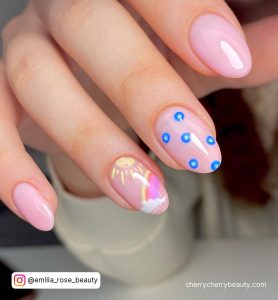Pastel Pink Blue And Yellow Nails In Almond Shape