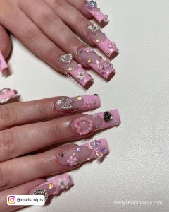 Pastel Pink French Tip Nails With Embellishments