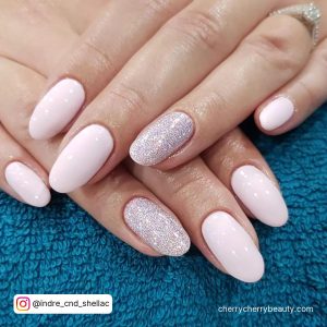 Pastel Pink Glitter Nails In Almond Shape
