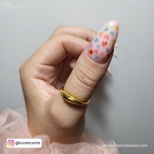 Pastel Pink Nail Ideas With Colorful Hearts