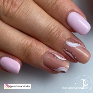 Pastel Pink Nails With Glitter In Marble Design