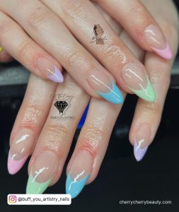 Pastel Pink Stiletto Nails With Green, Purple, And Blue Tips