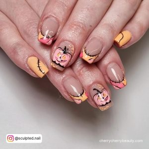 Pink And Orange Halloween Nails With Pumpkins